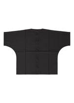 The IM MEN COMPACT SHIRT is black, short-sleeved, and boxy with wide sleeves and a flat, seamless design. Made from lightweight fabric, it is displayed on a white background.