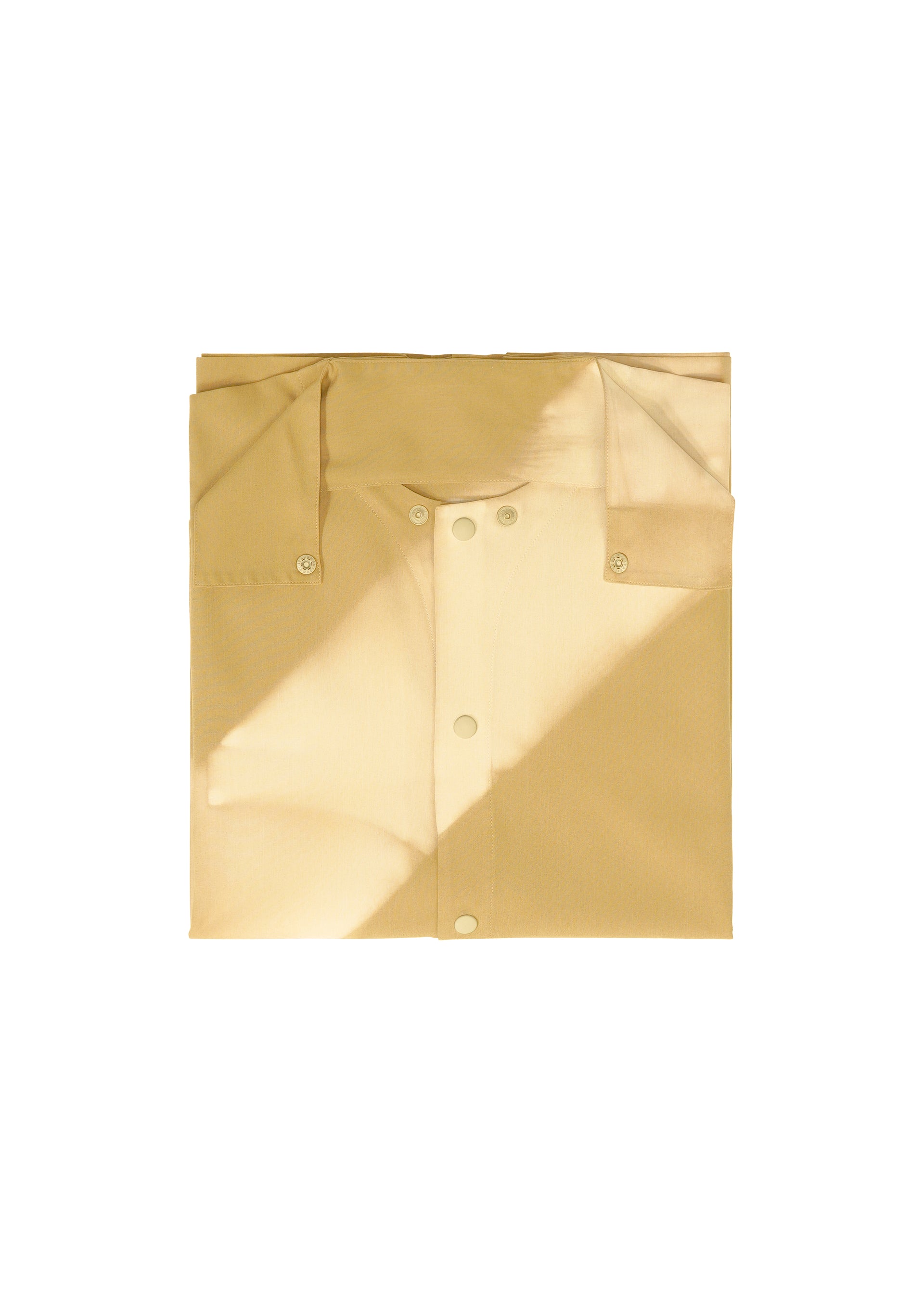 Zoomed view The ITAJIME SHIRT by IM MEN is a neatly folded beige button-up shirt with a collar, crafted using a traditional dyeing technique that creates a subtle geometric pattern, and is displayed against a plain white background.