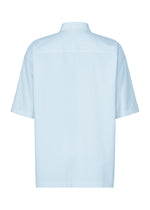 An IM MEN WHITE SHIRT is displayed from the back, featuring a simple collar and short sleeves. The shirt has no visible patterns, designs, or logos, and the fabric looks smooth and lightweight.