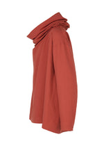 A rust-toned, long-sleeve top from the IM MEN COTTON YAK collection features a generously draped cowl neck and is crafted from luxurious cotton yak fabric. Shown in side profile against a white background, this distinctive piece is part of the IM MEN Autumn Winter 2026/27 line.