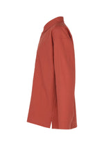 Side view of the IM MEN COTTON YAK long-sleeved shirt crafted from soft cotton yak fabric, featuring a collar, button-down front, and straight hem. The shirt’s natural texture is highlighted against a white background.