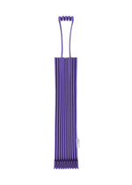 The TRUNK PLEATS BAG 12 by me ISSEY MIYAKE in purple features vivid color variations, a unique top handle, an accordion-style fold, and a small white label on the right side. - BLUEBELL （no.98）