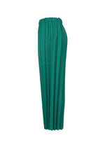 COLOR PLEATS BOTTOM by me ISSEY MIYAKE: green pleated wide-leg pants with an elastic waistband, made from lightweight fabric and displayed in a side view against a white background.