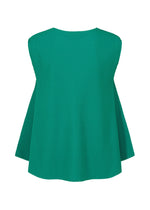 The SWING PLEATS sleeveless top by me ISSEY MIYAKE features fine green knit pleats, a round neckline, and a flowy silhouette highlighted from the back against a plain white background.
