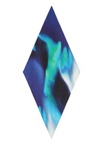 The AURORA PLEATS STOLE by me ISSEY MIYAKE features a diamond-shaped design with swirling blue, green, and white shades in an aurora-inspired, wave-like pattern on a plain white background.