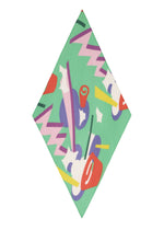 The SURPRISE BOX PLEATS STOLE by me ISSEY MIYAKE features a playful diamond-inspired design in green, accented with red, purple, yellow, and white zigzags, circles, and organic shapes for a vibrant look.