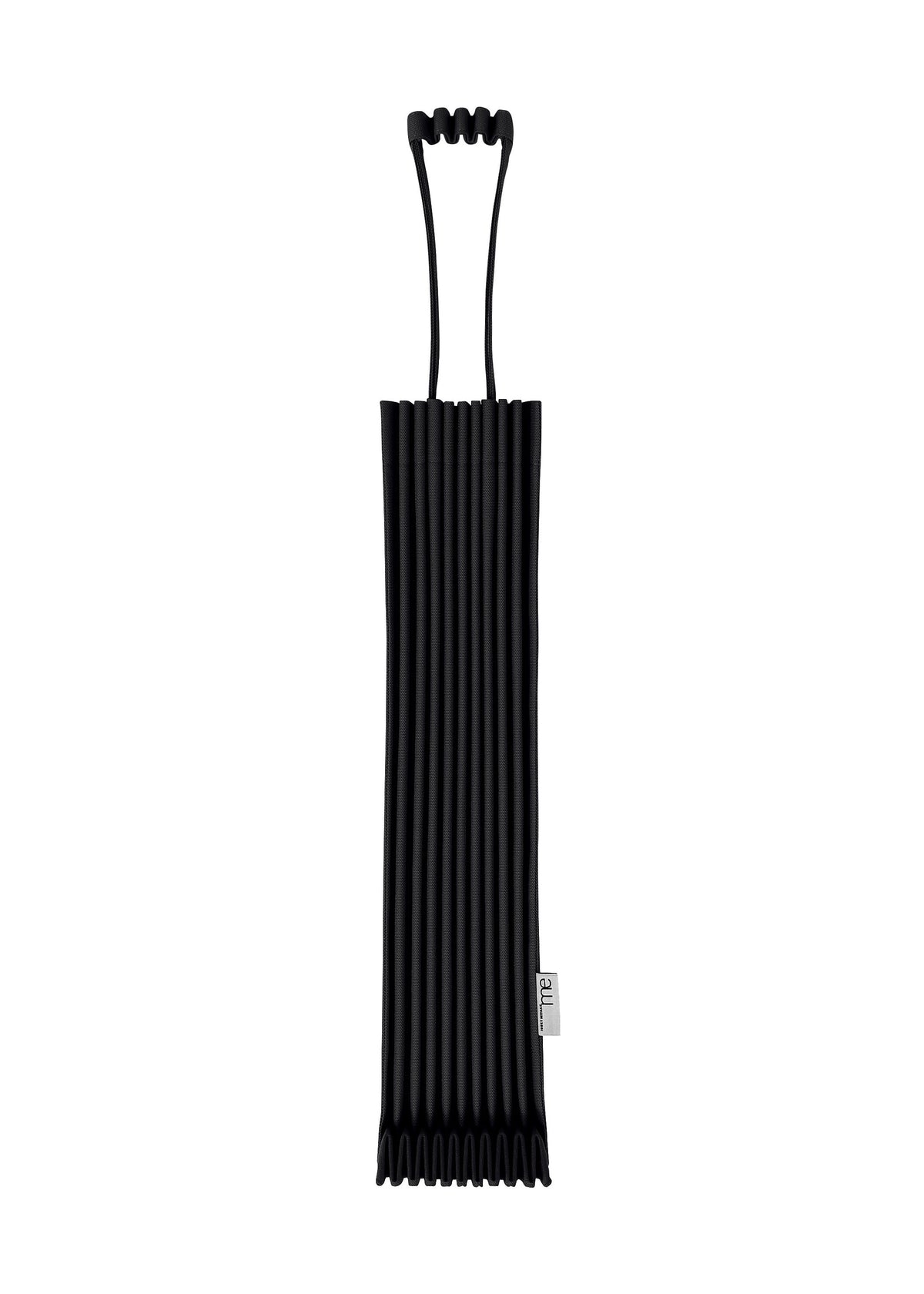 A black, ribbed, rectangular TRUNK PLEATS BAG 12 by me ISSEY MIYAKE, featuring two distinctive loop handles at the top and a small white side tag, photographed against a white background. view 8 of 14