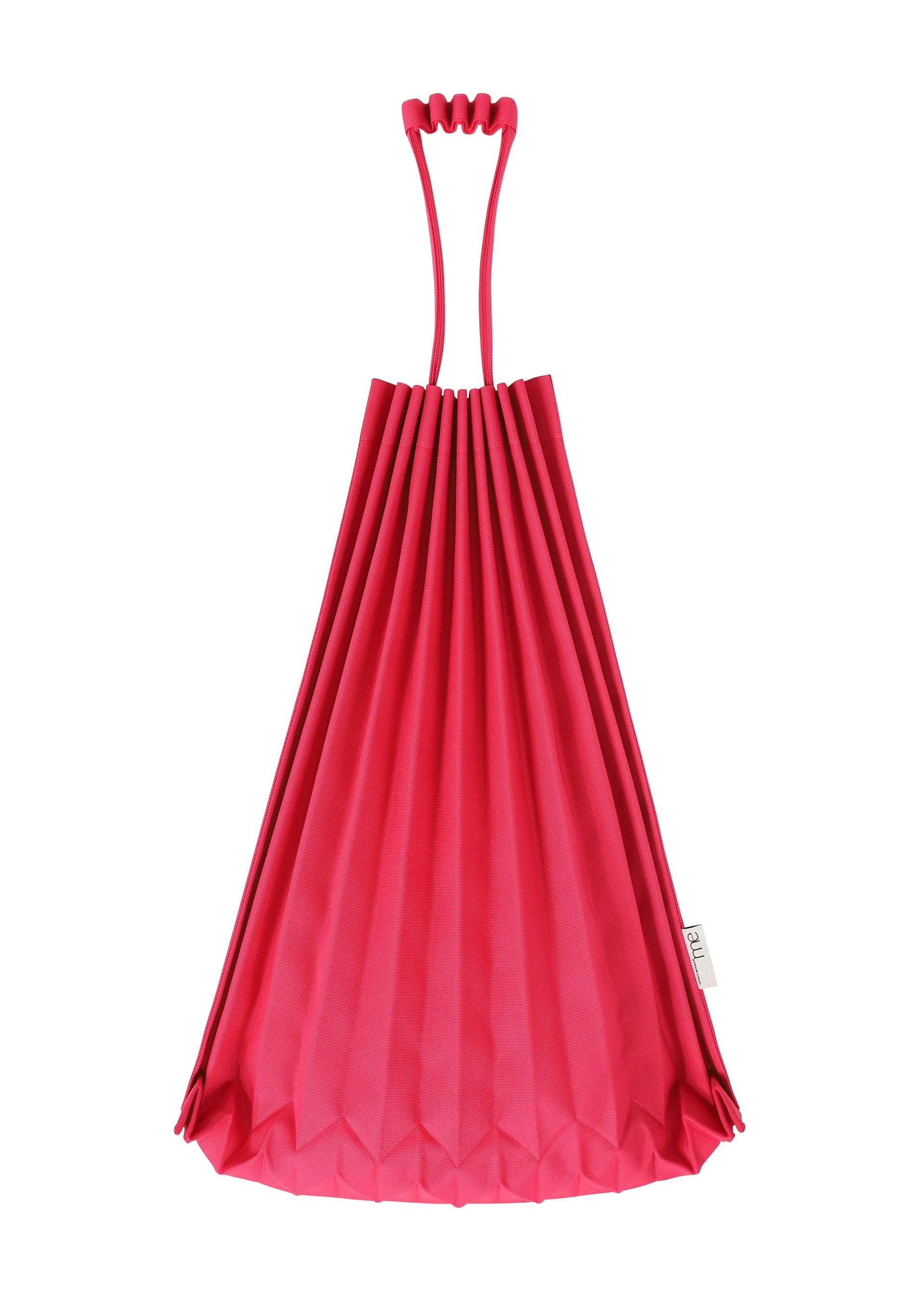 Zoomed view The TRUNK PLEATS BAG 12 by me ISSEY MIYAKE is a vivid red tote with distinctive handles and a sculptural, fan-like silhouette, shown upright against a white background.