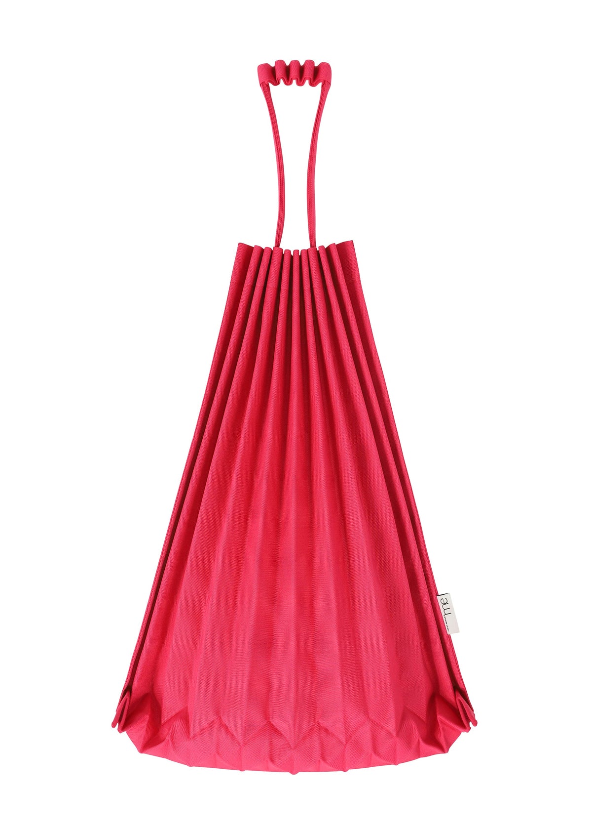 A bright pink TRUNK PLEATS BAG 12 by me ISSEY MIYAKE stands upright in its vivid, pleated origami-style design with a unique handle against a white background. view 7 of 8