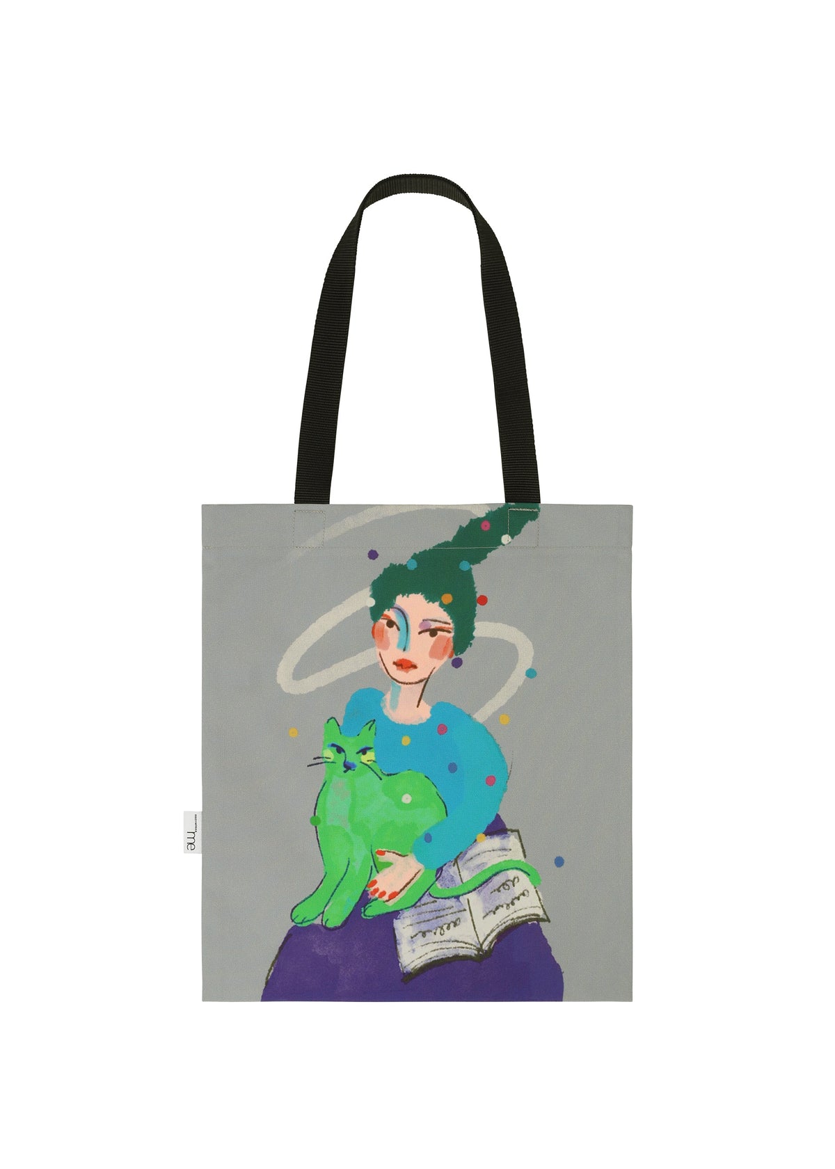 The me ISSEY MIYAKE CAT BAG features black handles and a vibrant design of a green-haired person holding a green cat beside an open book, with swirling shapes and dots on a gray background for a whimsical touch. view 3 of 4