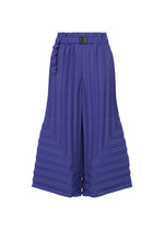 The COLOR PLEATS BOTTOM by me ISSEY MIYAKE features wide-leg, high-waisted purple pants with a belted waist and horizontal pleats at the lower legs, creating a striking flared silhouette against a plain white background. - COBALT BLUE （no.74）