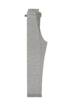 A pair of REmeTEX NEP DENIM sweatpants by me ISSEY MIYAKE in light gray, heathered fabric made from recycled polyester, neatly folded on a white background. Features include an elastic waistband and cuffs.