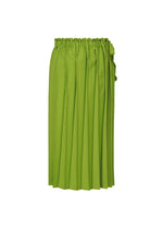 The CROSS PLEATS by me ISSEY MIYAKE is a bright green hand-pleated midi skirt with unique pleats, a gathered elastic waistband, and a bow detail on the side, shown against a white background. - LEAF GREEN （no.60）