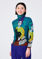 A woman with short dark hair smiles while wearing the me ISSEY MIYAKE CAT high-neck, long-sleeved top with illustrated figures, a black cat, and open books, paired with bright blue pleated pants against a light background.