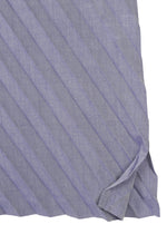A close-up of the ANGLE PLEATS SHIRT by me ISSEY MIYAKE in light purple, featuring diagonal stripes and a folded hemmed corner that highlights its melange finish.