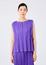A woman with straight black hair pulled back wears the me ISSEY MIYAKE CROSS PLEATS sleeveless top and matching skirt in bright purple stretch pleats, standing against a plain white background and facing forward with a neutral expression.