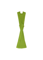 The CROSS PLEATS by me ISSEY MIYAKE, a bright green cummerbund with stretch pleats, is displayed vertically against a plain white background.