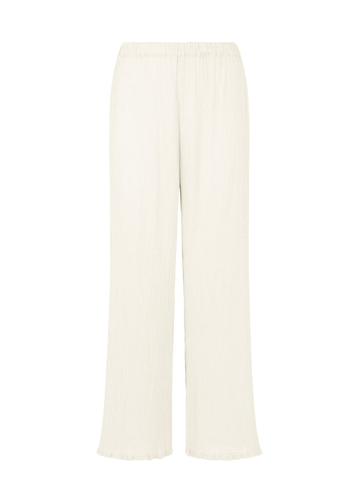 The SEE-THROUGH CREPE COLOR pants by me ISSEY MIYAKE are loose-fitting, full-length, straight cream or off-white pants with an elastic waistband and crinkled, product-dyed fabric, shown on a plain white background. view 1 of 6