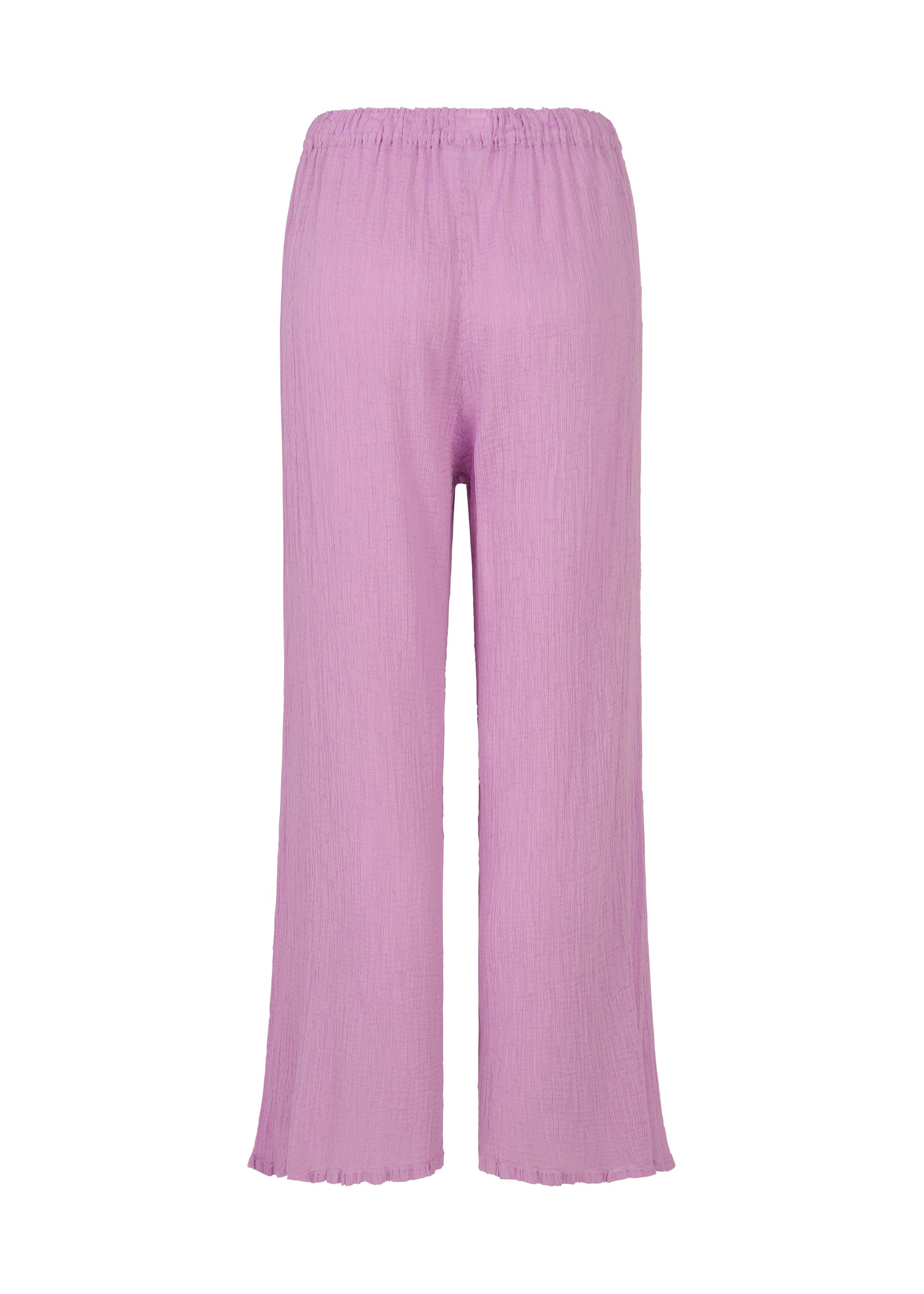 Zoomed view Rear view of SEE-THROUGH CREPE COLOR pants by me ISSEY MIYAKE in light purple. Made from product-dyed fabric, these loose, wide-leg pants have an elastic waistband and a slightly crinkled texture for a relaxed fit.