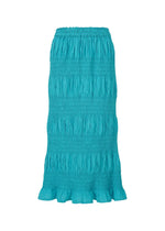 The SHRINK STRIPE by me ISSEY MIYAKE is a turquoise, ankle-length cotton blend skirt with a textured ruched design and ruffled hem, shown on a plain white background. - TURQUOISE (no.73)