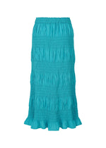 The SHRINK STRIPE skirt by me ISSEY MIYAKE is a turquoise, ankle-length cotton blend with a smocked, ruched texture and ruffled hem, shown on a plain white background.