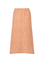 A knee-length, peach cotton skirt made from textured boucle fabric with an elastic waistband, the SURPRISE BOX PRINT CAULIFLOWER by me ISSEY MIYAKE is displayed against a plain white background.