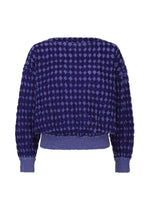 The DIAMOND FLOCKY CAULIFLOWER sweater by me ISSEY MIYAKE features long sleeves, a textured deep blue fabric with geometric diamond-patterned flocking, ribbed cuffs and waistband, displayed from the back on a white background. - BLUE-HUED （no.78）