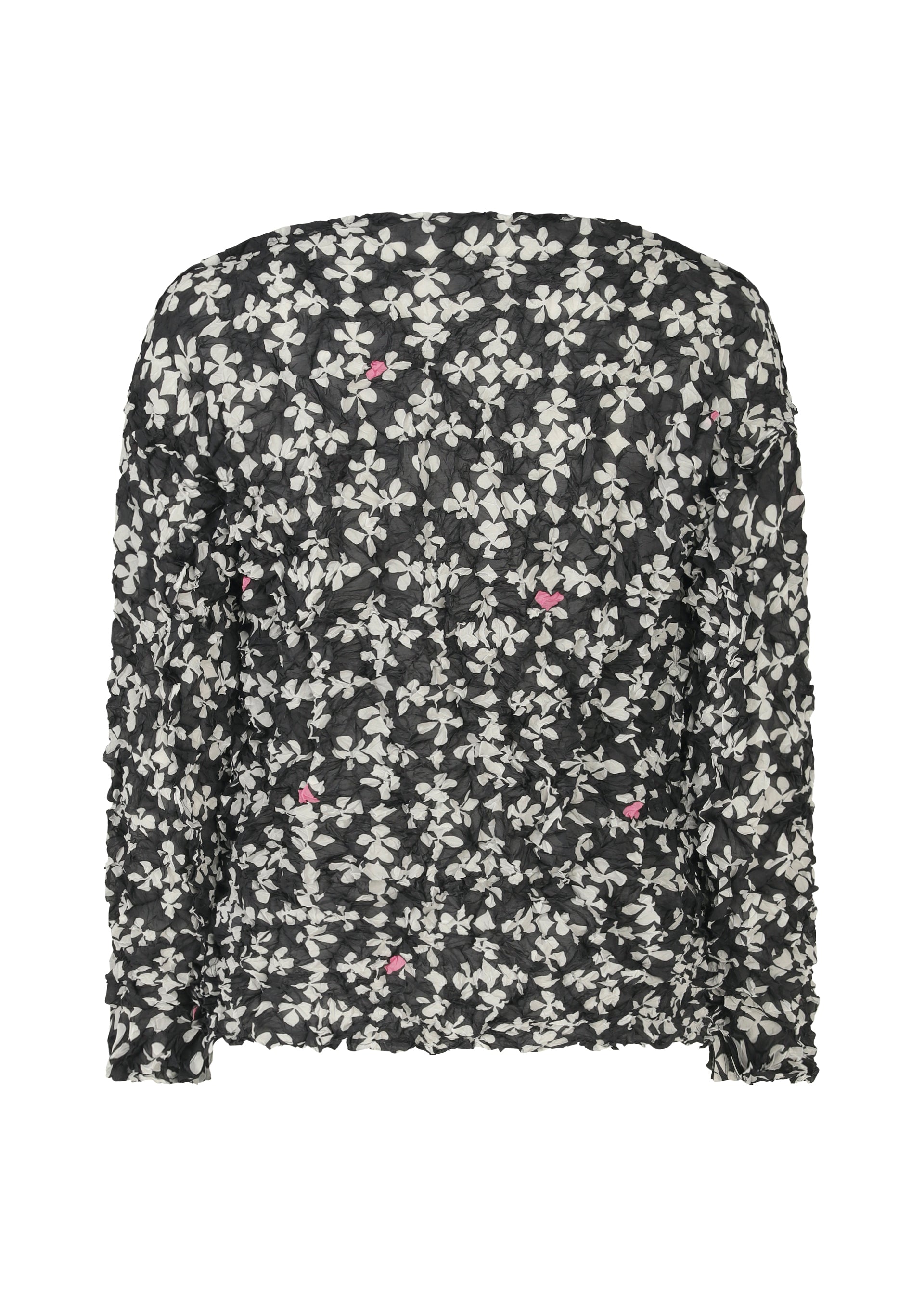 Zoomed view The SUIT MERINGUE TOP by me ISSEY MIYAKE is a black, round-neck, long-sleeved top with white floral and pink accents and a crushed pleat texture, shown against a white background.
