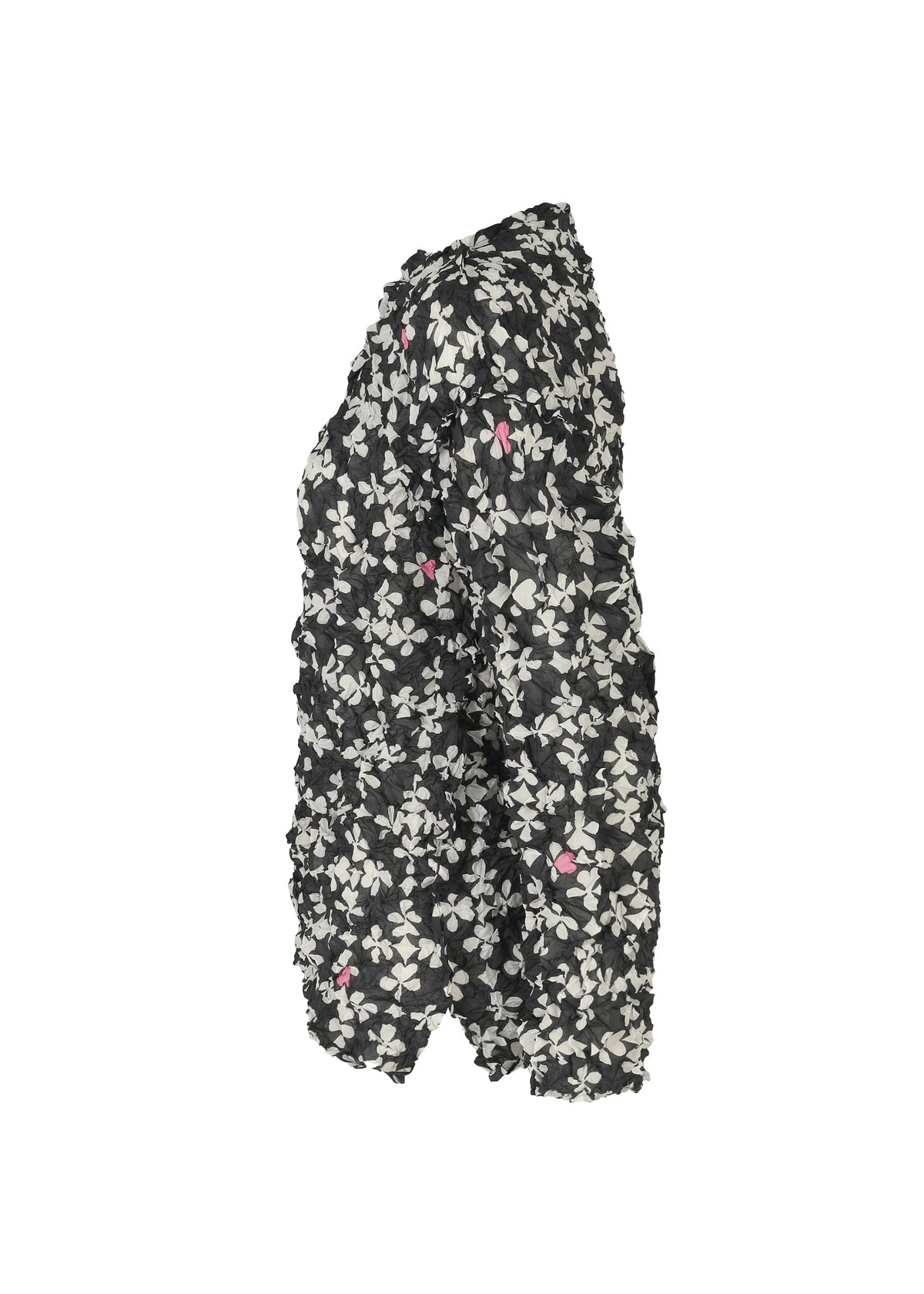 Side view of the SUIT MERINGUE TOP by me ISSEY MIYAKE—a textured black jacket with a white and pink floral pattern and a puffy, crushed pleat look—shown against a white background. view 5 of 8