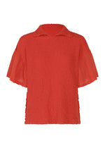 The SHEER CAULIFLOWER by me ISSEY MIYAKE is a red, short-sleeved blouse with a soft collar, flared sleeves, textured fabric, and slightly sheer details for relaxed cotton comfort and casual style. - RED （no.24）