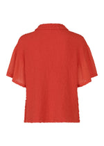 A back view of the SHEER CAULIFLOWER blouse by me ISSEY MIYAKE, featuring short sleeves, textured red fabric, a flat collar, sheer sleeves, and a relaxed cotton fit for effortless chic.