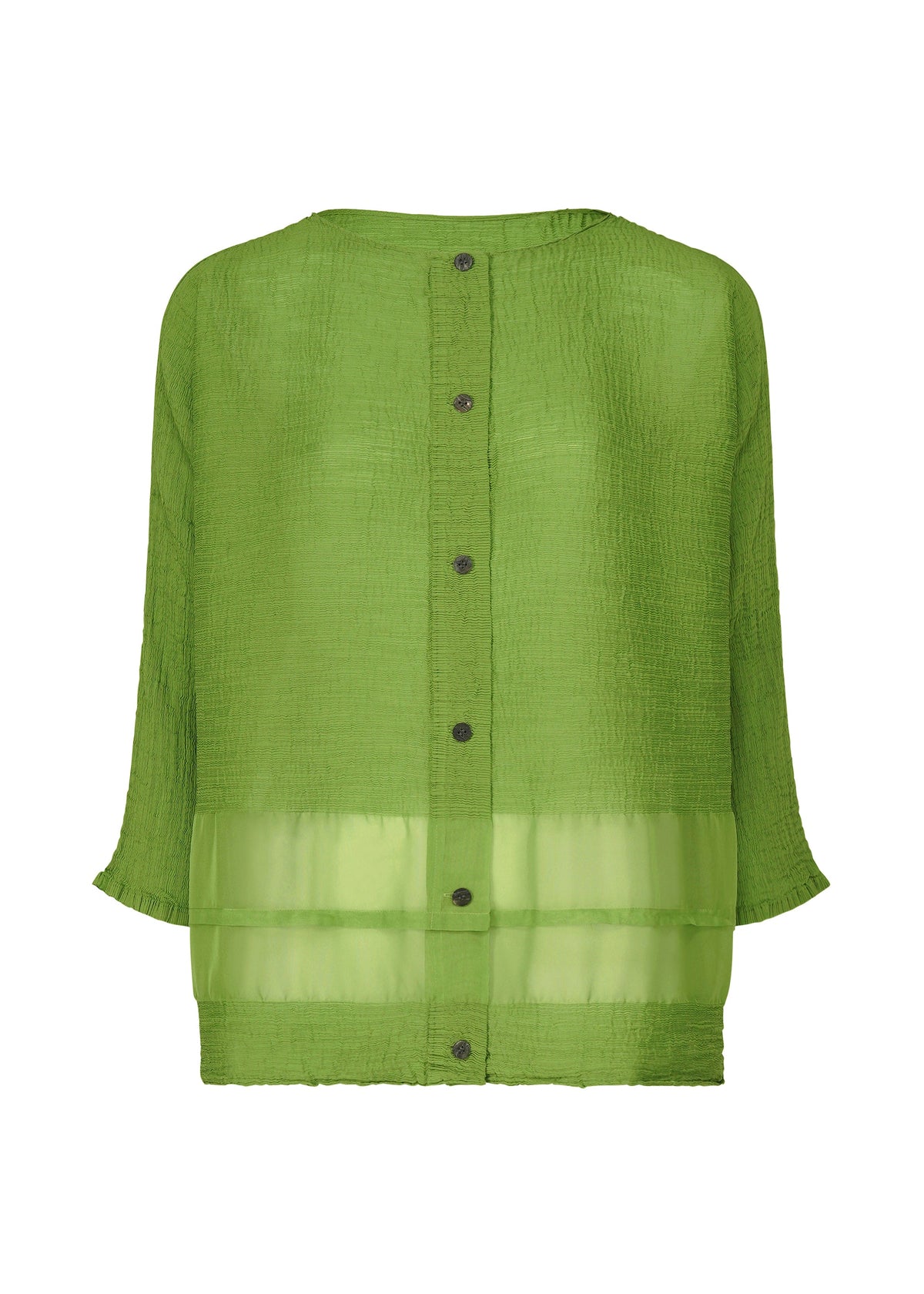 The SHEER SEE-THROUGH CREPE by me ISSEY MIYAKE is a loose-fitting green blouse made from garment-dyed fabric, featuring long sleeves, front buttons, and a sheer horizontal panel near the hem, shown on a white background. view 2 of 7