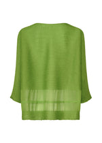 The SHEER SEE-THROUGH CREPE blouse by me ISSEY MIYAKE is a loose-fitting, light green textured top with three-quarter sleeves, made from garment-dyed fabric and featuring a sheer horizontal band near the hem, shown on a white background.