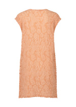The SURPRISE BOX PRINT CAULIFLOWER by me ISSEY MIYAKE is a peach, short-sleeved cotton tunic shown from the back. It features a loose, straight fit with a crinkled pattern from pigment printing and has no visible fastenings or embellishments.