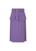 The FLAT JERSEY dress by me ISSEY MIYAKE is a knee-length, sleeveless lavender piece with a wide ruffled top band, front tie detail, and seamless skirt, shown against a plain white background. - VIOLET （no.82）