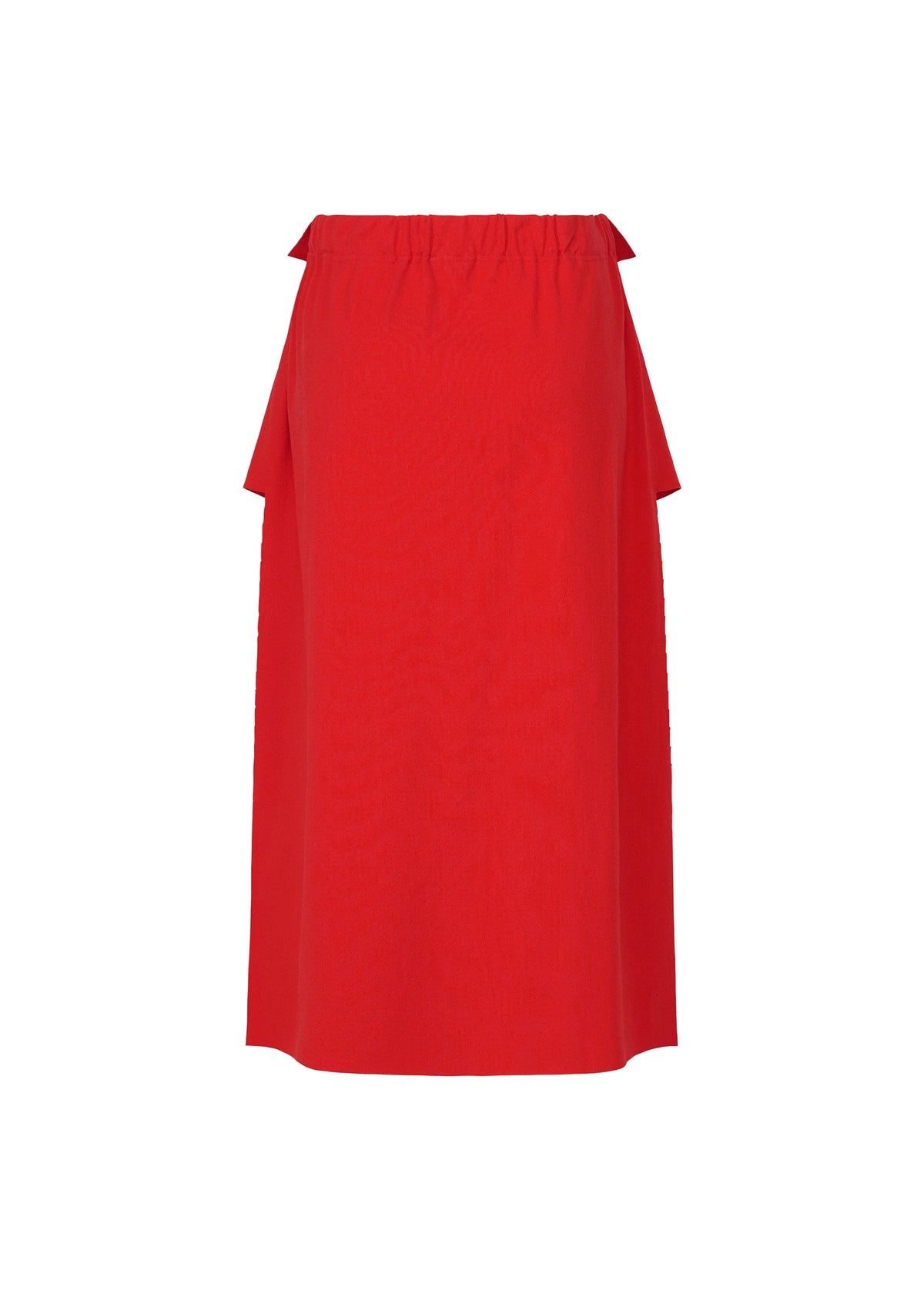 The FLAT JERSEY skirt by me ISSEY MIYAKE is a vibrant red, knee-length cotton-blend skirt featuring an elastic waistband and minimalistic, straight silhouette—no visible patterns or pockets, making it a versatile choice for any occasion. view 4 of 8