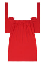 The FLAT JERSEY dress by me ISSEY MIYAKE is a bright red, off-the-shoulder style with an elasticized neckline and wide shoulder straps. Its seamless skirt and modern, simple design offer a polished look when laid flat.