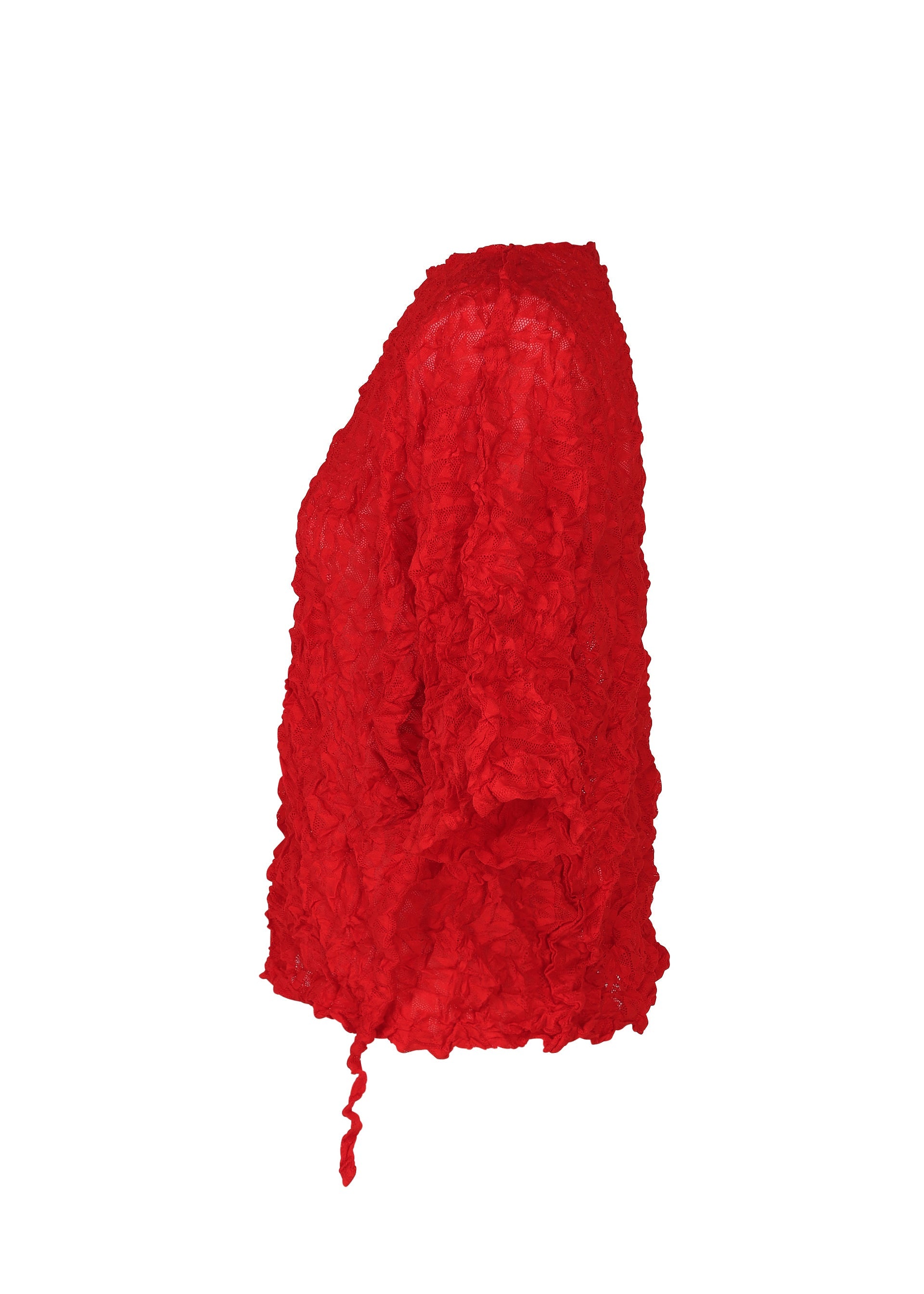 Zoomed view The KALEIDOSCOPE LACE MERINGUE top by me ISSEY MIYAKE is shown from the side, highlighting its bright red crinkled, ruffled texture and loose, flowing hem finished with a trailing tie.