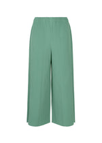 The FINE KNIT PLEATS BOTTOM 1 by me ISSEY MIYAKE features wide-leg green pants with fine knit pleats and an elastic waistband, made from lightweight knit, displayed on a plain white background. - SAGE GREEN （no.61）