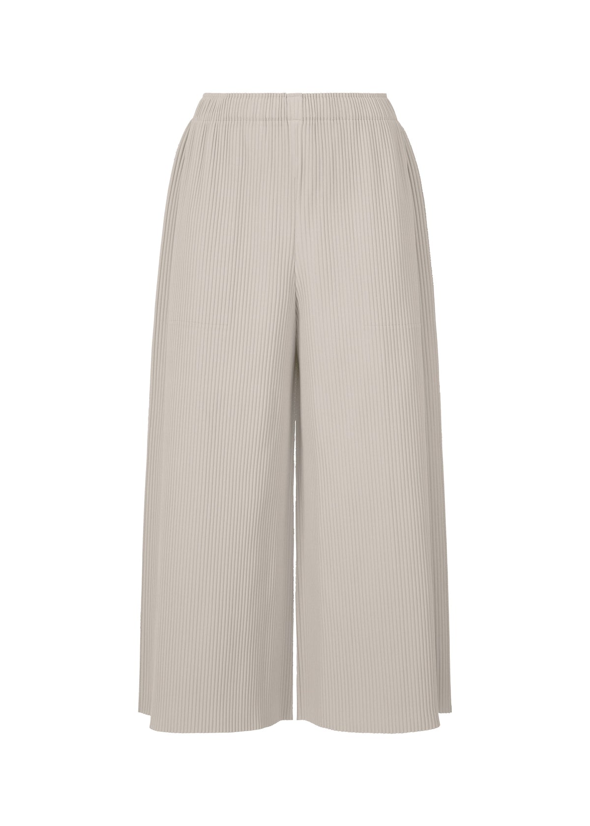 The FINE KNIT PLEATS COLOR 2 by me ISSEY MIYAKE features light beige, wide-leg culotte pants with an elastic waistband and fine knit pleats, made from textured fabric and shown against a white background. view 1 of 7