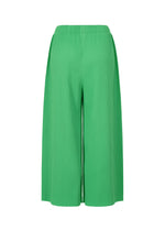 The me ISSEY MIYAKE FINE KNIT PLEATS BOTTOM 2 features bright green, wide-leg pleated knit pants with an elastic waistband, shown against a plain white background.