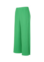 The me ISSEY MIYAKE FINE KNIT PLEATS BOTTOM 2 are green, high-waisted wide-leg knit pants with an elastic waistband and fine pleats, shown on a plain white background.