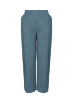 The MIX FINE KNIT PLEATS BOTTOM by me ISSEY MIYAKE features high-waisted, straight-leg ribbed blue knit pants with an elastic waistband and side pockets, shown against a white background. - BLUE-HUED （no.78）