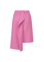 The TRICK PLEATS skirt by me ISSEY MIYAKE is a pink, knee-length, lightweight pleated piece with a three-dimensional silhouette and an asymmetric front flap, shown against a white background.