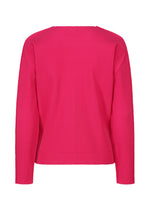 The me ISSEY MIYAKE FINE KNIT PLEATS COLOR 1 sweater, shown laid flat with the back facing up on a white background, is bright pink, long-sleeved, ribbed, and features a simple round neck with no visible embellishments or fastenings.