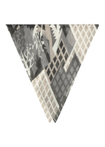 The BUILDING PLEATS STOLE by me ISSEY MIYAKE is a triangular scarf adorned with a grayscale abstract pattern of geometric grids and foliage silhouettes, evoking the essence of urban rooftop farming, and presented on a white background. - GRAY-HUED （no.17）