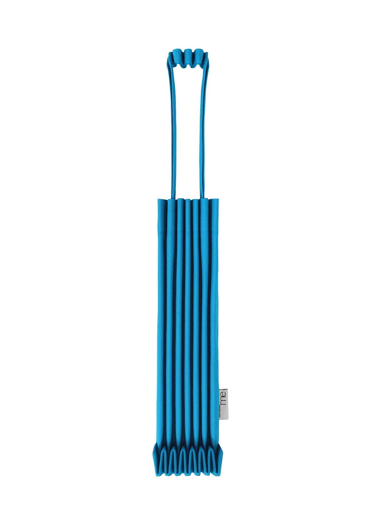 The TRUNK PLEATS BAG 12 by me ISSEY MIYAKE, in a vivid blue color with an elongated pleated design, features a small top handle and a white tag on the right side, and is photographed against a white background. view 11 of 14