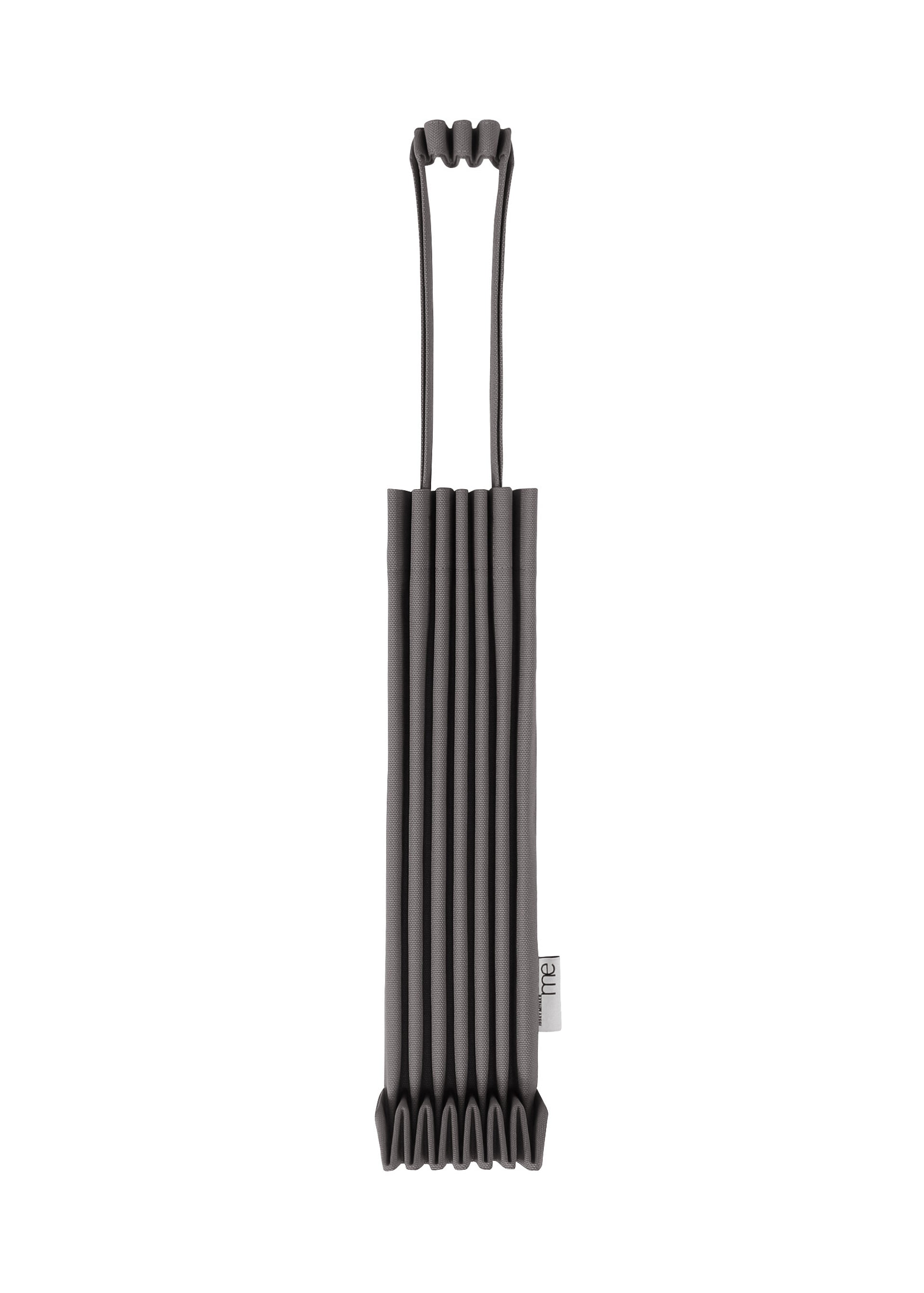 Zoomed view The TRUNK PLEATS BAG 12 by me ISSEY MIYAKE, a black accordion-style mini tote with two looped handles and a small white side tag, is showcased strikingly against a white background. - CHARCOAL （no.14）