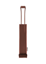 A brown TRUNK PLEATS BAG 12 by me ISSEY MIYAKE, made from pleated fabric in a mini tote silhouette with long handles, is shown upright against a white background. This stylish bag features distinctive pleats and a small tag with text sewn near the bottom on one side. - BORDEAUX （no.84）