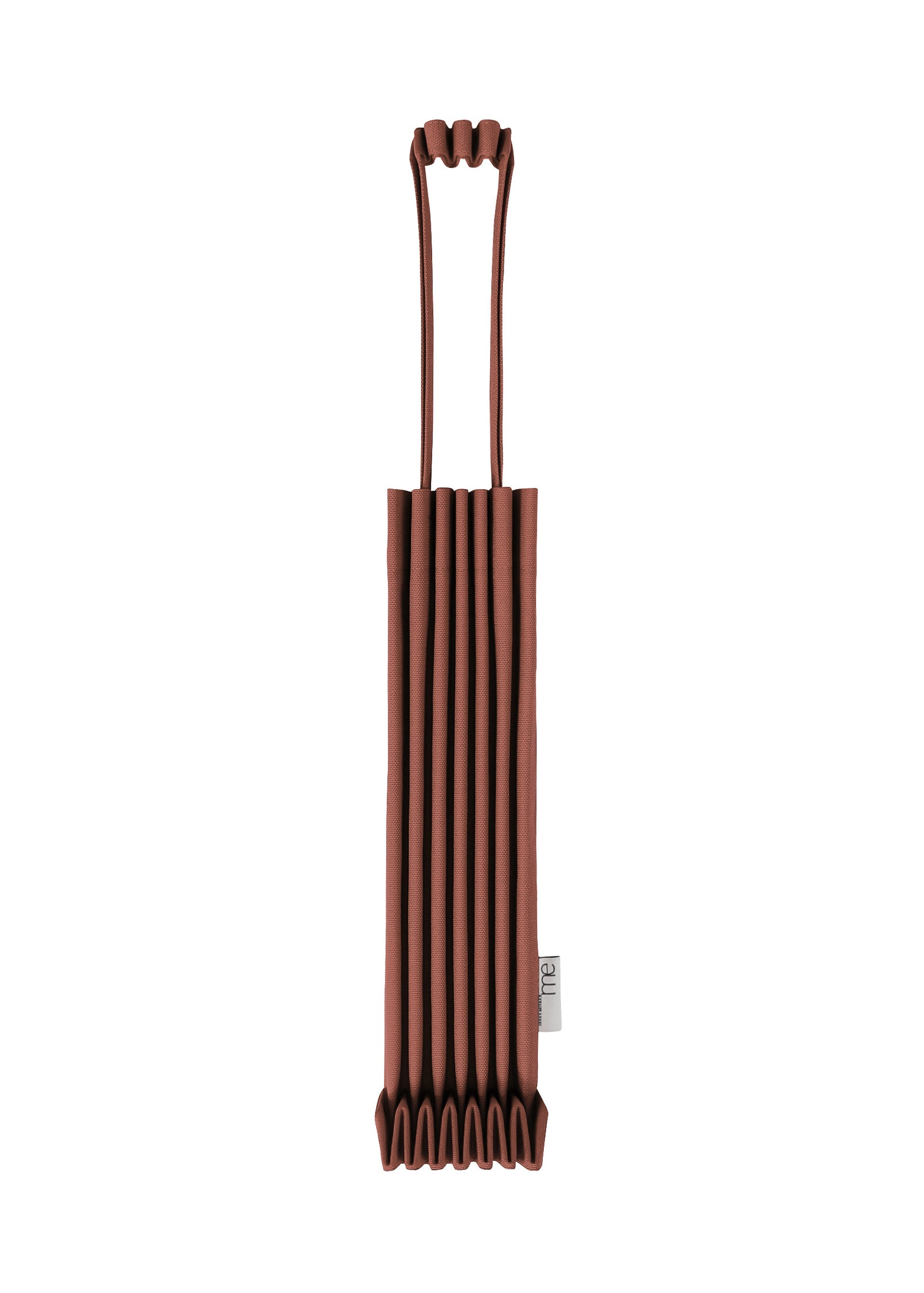 Zoomed view A brown TRUNK PLEATS BAG 12 by me ISSEY MIYAKE, made from pleated fabric in a mini tote silhouette with long handles, is shown upright against a white background. This stylish bag features distinctive pleats and a small tag with text sewn near the bottom on one side. - BORDEAUX （no.84）